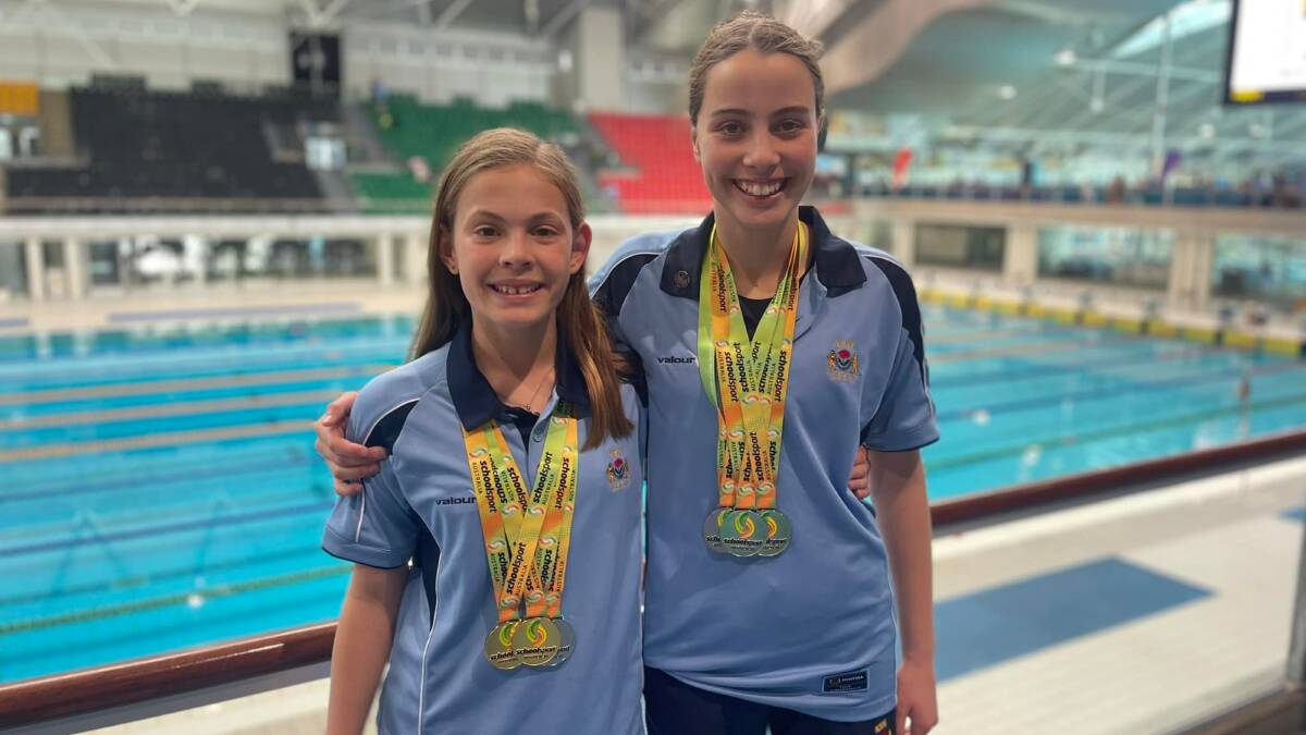 Molly Ramien and Alexis Whitton are all smiles after their stellar results over the last three days. Picture by Swimming Gunnedah Inc.