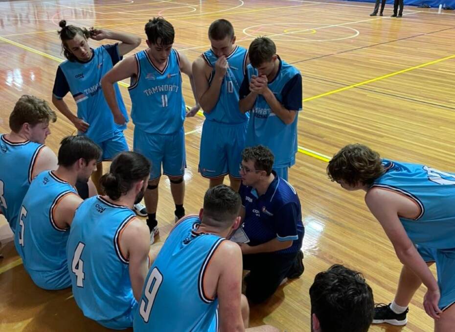 In the huddle: Mitch Balderston addresses the team during their game on Sunday against Central Coast. Photo: Tamworth Basketball Association Facebook.