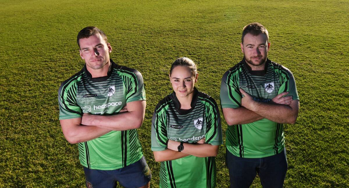 Good cause: Nicholas Wise, Montana-Rose Ellaley and Angus Hanlon model the special jerseys that will be auctioned off in aid of headspace Tamworth after Saturday's game. Photo: Gareth Gardner.