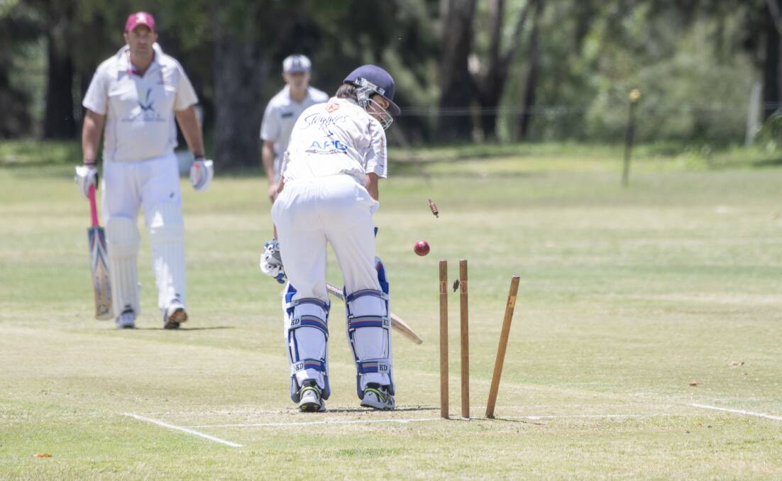 Out: This Wests batsmen can only watch as his stumps are rattled. Photo: Peter Hardin