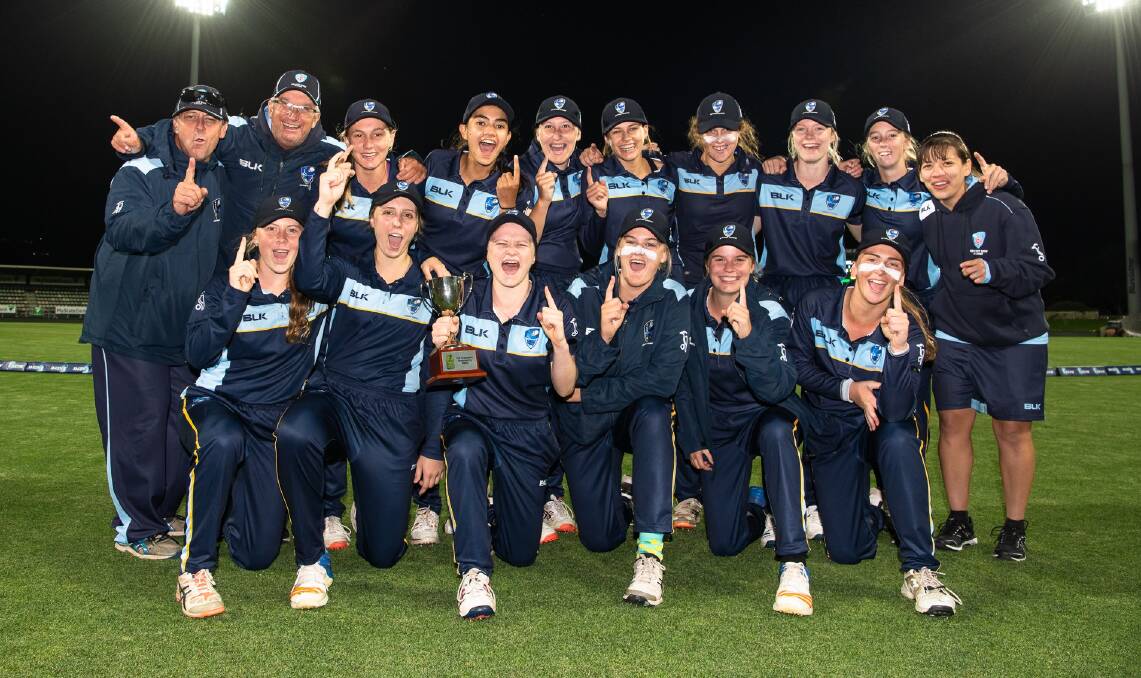 The sweet taste of success: Lara Graham (front left) and Jess Davidson (back fourth from left) with their victorious ACT/NSW Country under-18s side.
