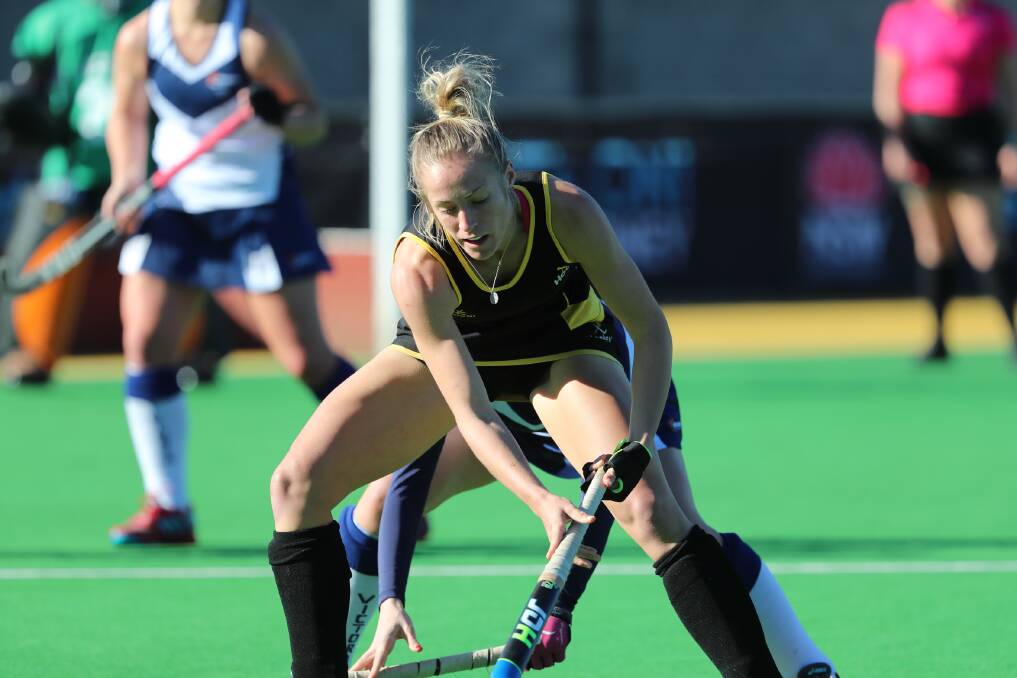 Stick skills: Claudia Nielsen in action for the Western Australian under-21s at last year's national championships. Photo: Click InFocus