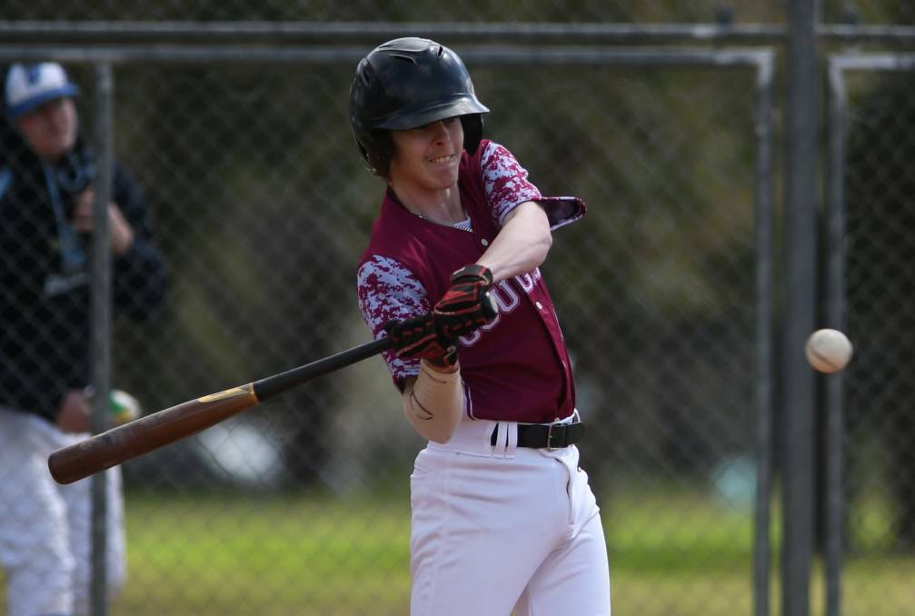 Focused: Ben Ridgewell was one of three players to hit a single for Cougars in their win over the UNE Armidale Outlaws on Saturday. Photo: Gareth Gardner