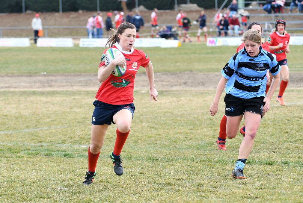Speed to burn: The sight of Fiona Laurie racing away to score has been a common one for Gunnedah this season. Photo: Lincoln Stewart