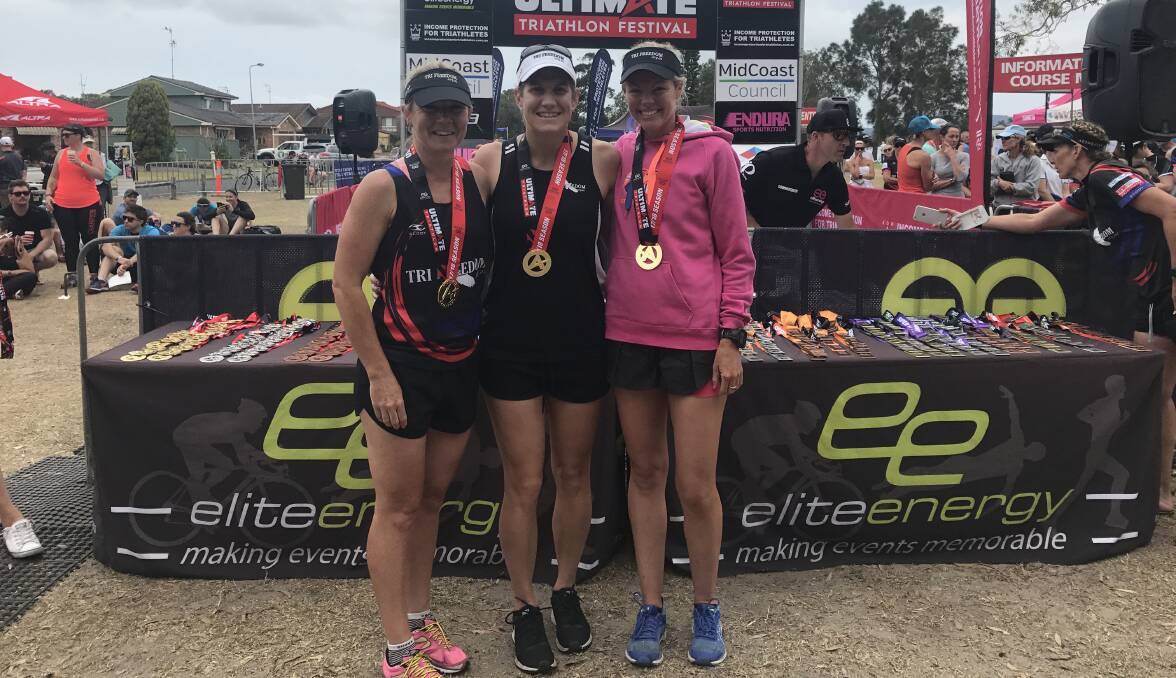 Girl power: Min McDonald, Libby Magann and Kelly Moore were the fastest team at the Forster Ultimate Triathlon on the weekend.