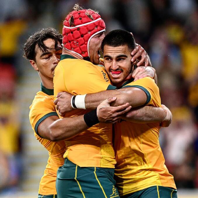 Great feeling: Harry Wilson envelopes Tom Wright after the Wallabies' opening try. Photo: Wallabies Facebook.