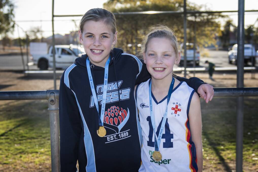 Winning smiles: Isabella Wall (left) and Abbie Peet (right) will represent NSW at the All Schools nationals in Queensland later this month. Photo: Peter Hardin.