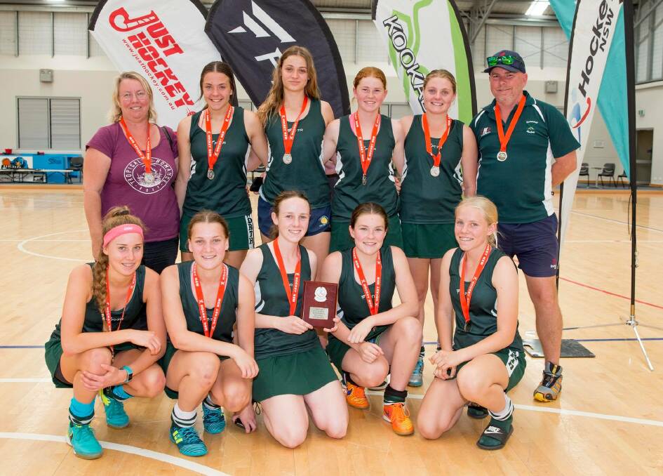 Sticking it to their rivals: The Tamworth under 18 girls finished runners-up in Division 2 at the weekend's state indoor championships. Photo: Tamworth Hockey Association Facebook page.