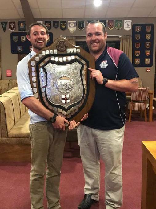 Perrett and former Red Devil Matt Jones hold the Yorkshire Shield - one of the sport's oldest trophies.