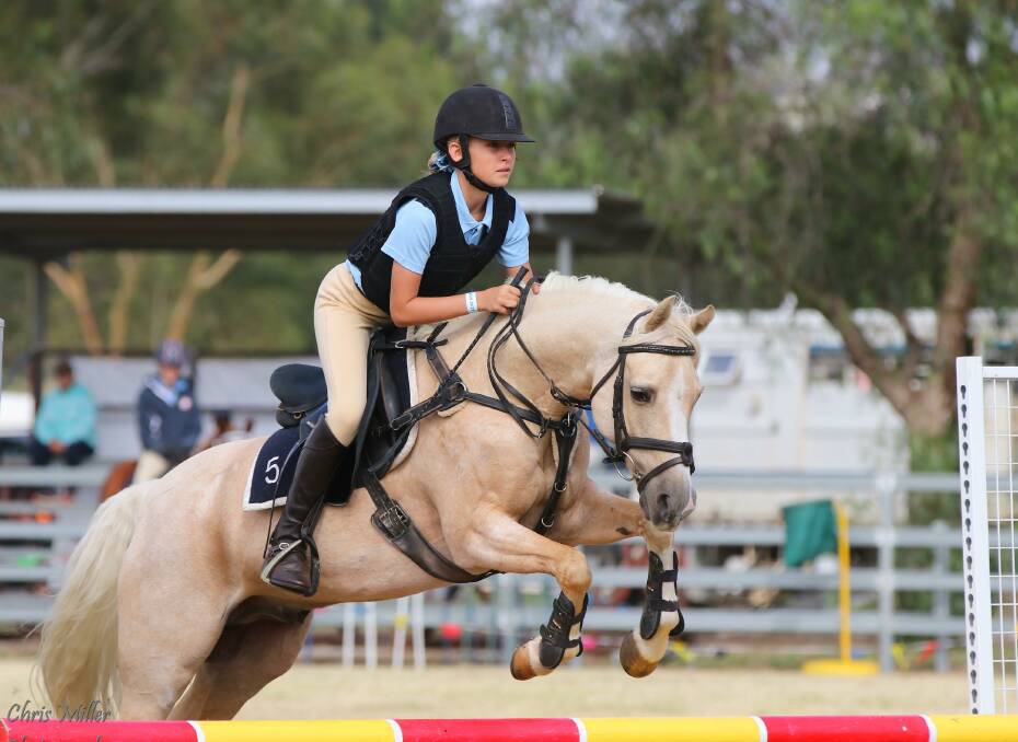 Team-work: Robin Henry, pictured here competing on her faithful horse Duges at the state tetrathlon championships, has been on top form this year. Photo: Chris Miller Photography