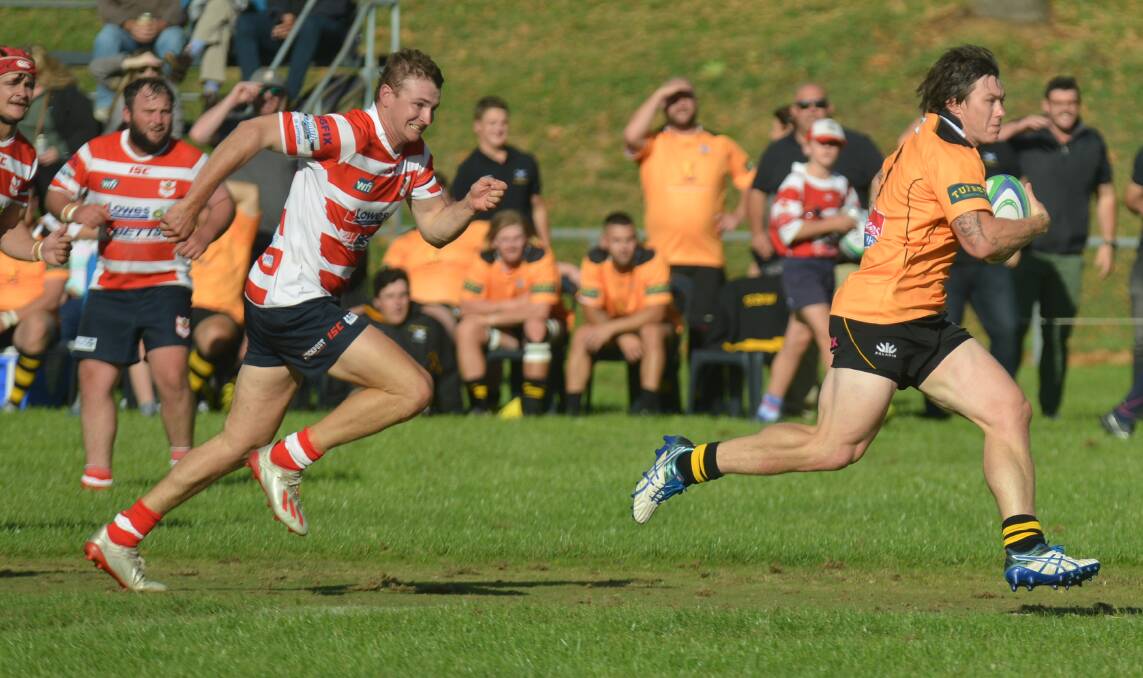 Catch me if you can: Jake Douglas streaks away to score Pirates' second try in what was a promising return from the former NSW Country rep.