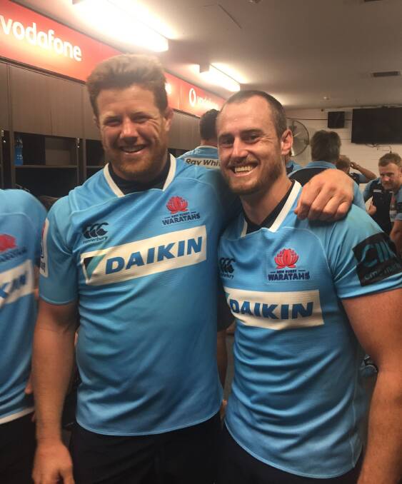 Snowden (right) with fellow former Pirate Paddy Ryan after making his debut for the Waratahs in 2018.