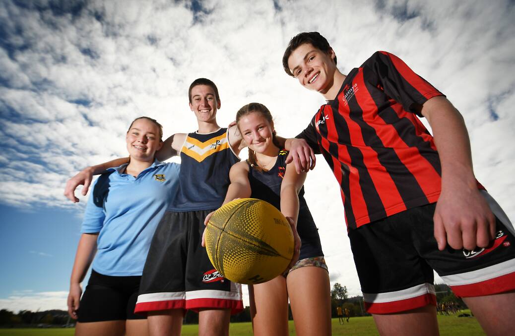 Having a ball: (L-R) Ella Murray (THS), Lawson Thompson (McCarthy), Emily Prout (Oxley) and Charlie Hargraves (Carinya) were among those that participated in the high schools gala day on Tuesday. Photo: Gareth Gardner 240522GGB01