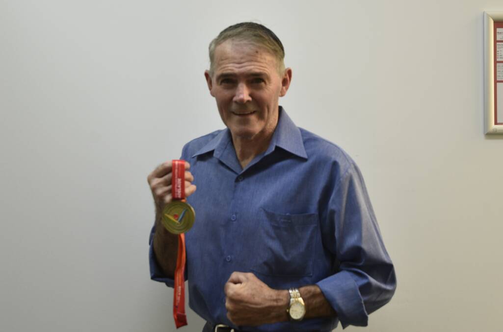 Golden gloves: Wayne Hall has added another gold medal to his collection.