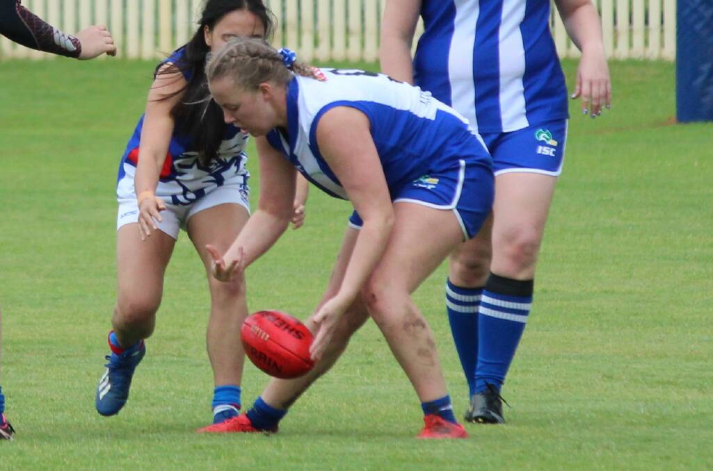 Hooked: After some hesitancy initially, from her first game of AFL Paige McMullen loved it. Photo: Sarah Dadd