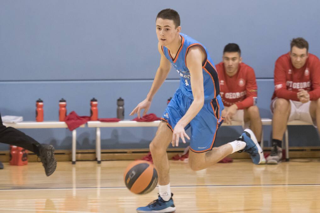 Riley Murphy drives up the court for the Thunderbolts. Photo: Peter Hardin 130419PHG385