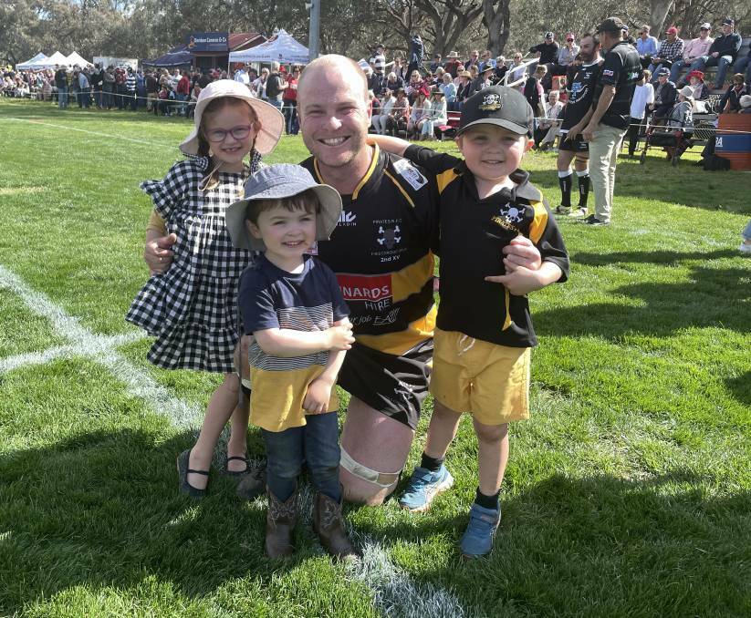 Wynne with his no.1 fans, daughter Ava, and sons Jack and Harry after last year's second grade premiership triumph.
