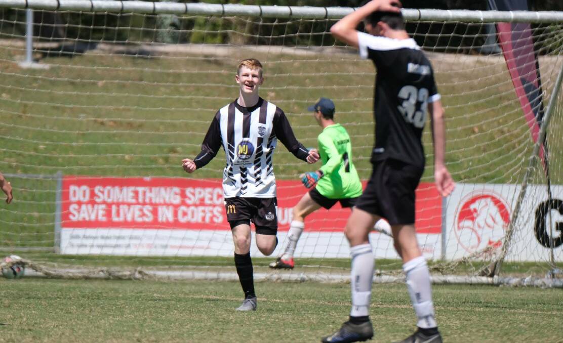 Brilliant effort: Will Albertson celebrates after one of his second half double which saw North Companions crowned under-15 champion of champions. 