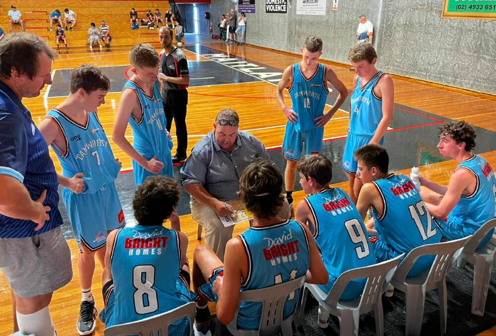 Expectations exceeded: Tamworth under-16s boys coaches John Ireland (pictured outlining plays) and Matt Parsons couldn't have asked for anything more from their charges on the weekend. Photo: Tamworth Basketball Association Facebook