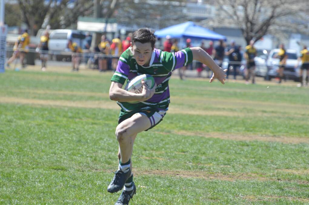 Evasive: Barraba/Gwydir fullback Liam slices through the Pirates defence to score the match clincher.