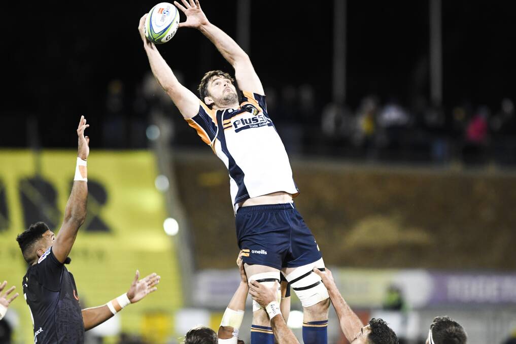 Safe hands: Sam Carter wins this lineout for the Brumbies during their quarter-final win over the Sharks on Saturday night. Photo: Dion Georgopoulos