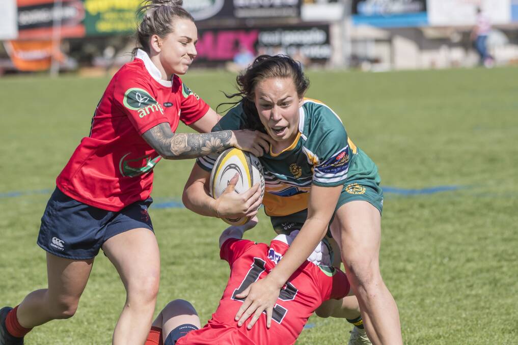 Strong: Inverell's Rhiannon Byers, here in action in the grand final, was adjudged one of the best players for the Brisbane leg of the Uni 7s Series. Photo: Peter Hardin