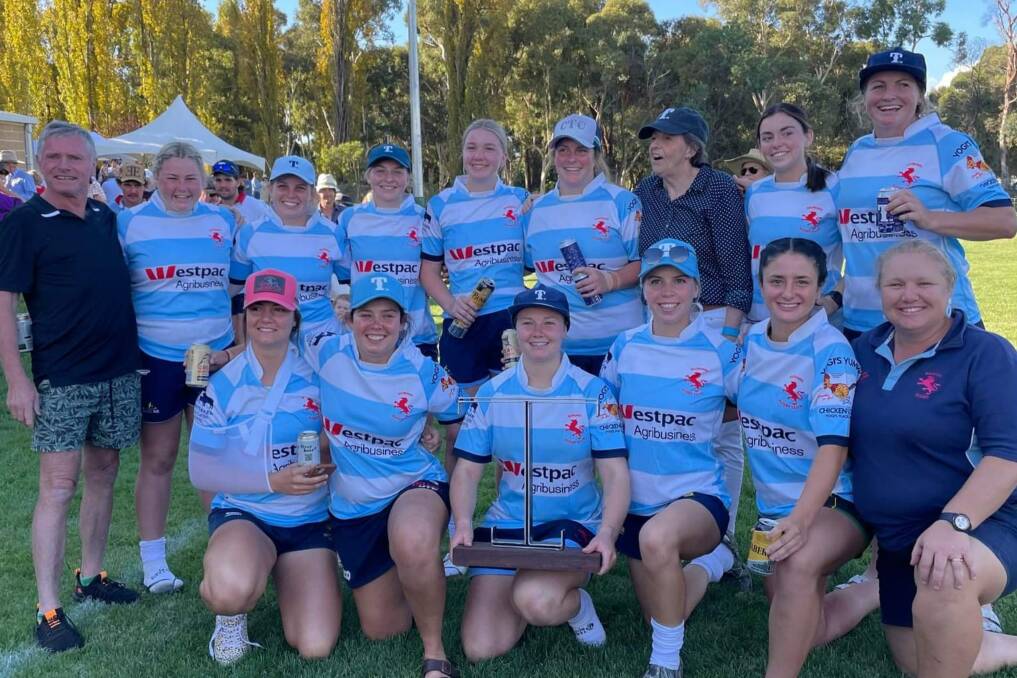 Special win: The victorious Quirindi team celebrate with Nick Tooth's father Graeme (back left) and mother Julie (back third from right) after making it back-to-back Toothy Tens triumphs. Photo: Quirindi Rugby Club Facebook