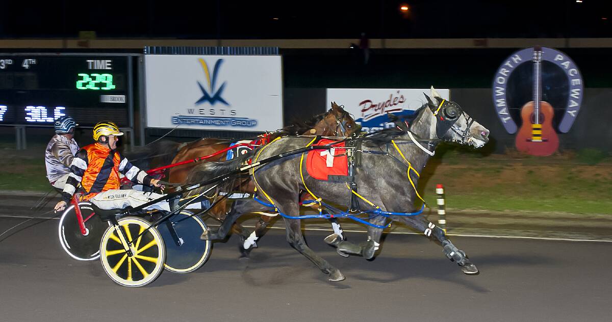 Mitch Faulkner is all smiles after driving Eurasian Muscle to victory at Tamworth on Friday night. Photo: PeterMac Photography