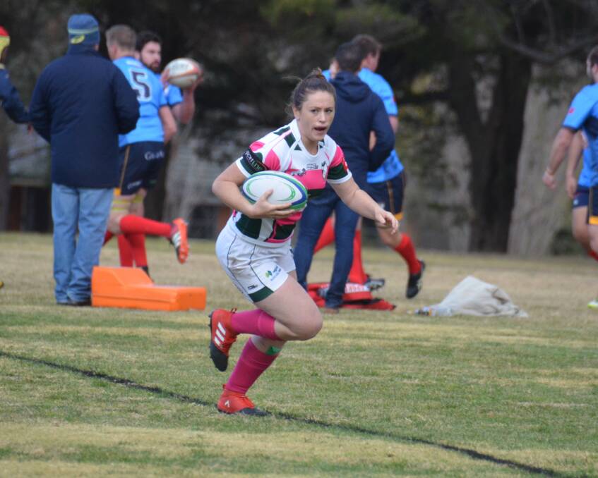 Try time: Lauren Clarke crosses for Robb College during the 2018 New England Rugby Union competition. 