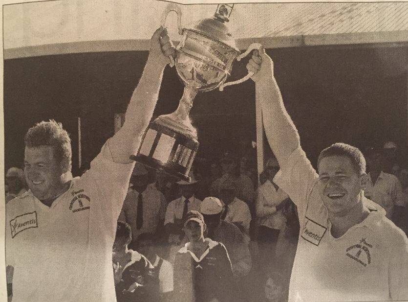 Glory days: Central North captain James Quinn (left) and veteran Charlie Franklin hold aloft the Caldwell Cup following their stirring 18-17 victory over Newcastle. The 2001 success remains the Kookaburras last Cup triumph.