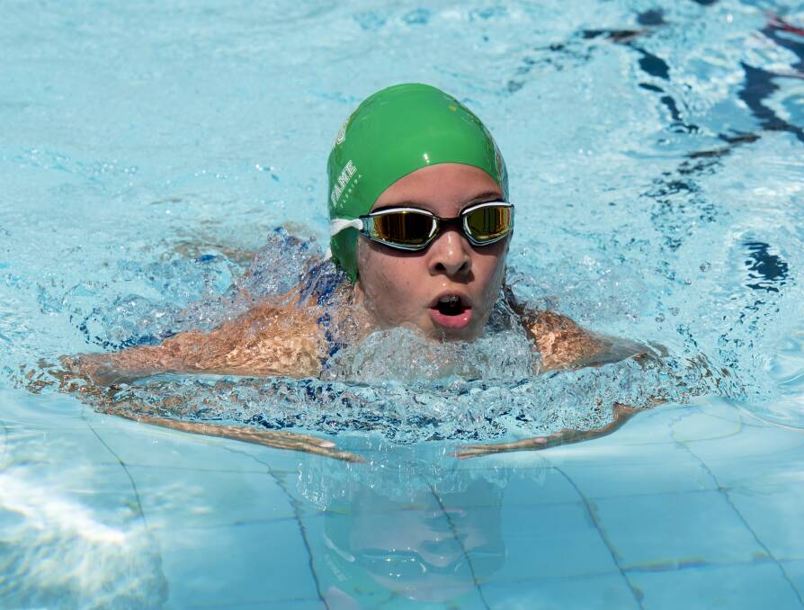 Scully Park's Shaynelle Mangan was among the legion of swimmers in action. Photo: Peter Hardin