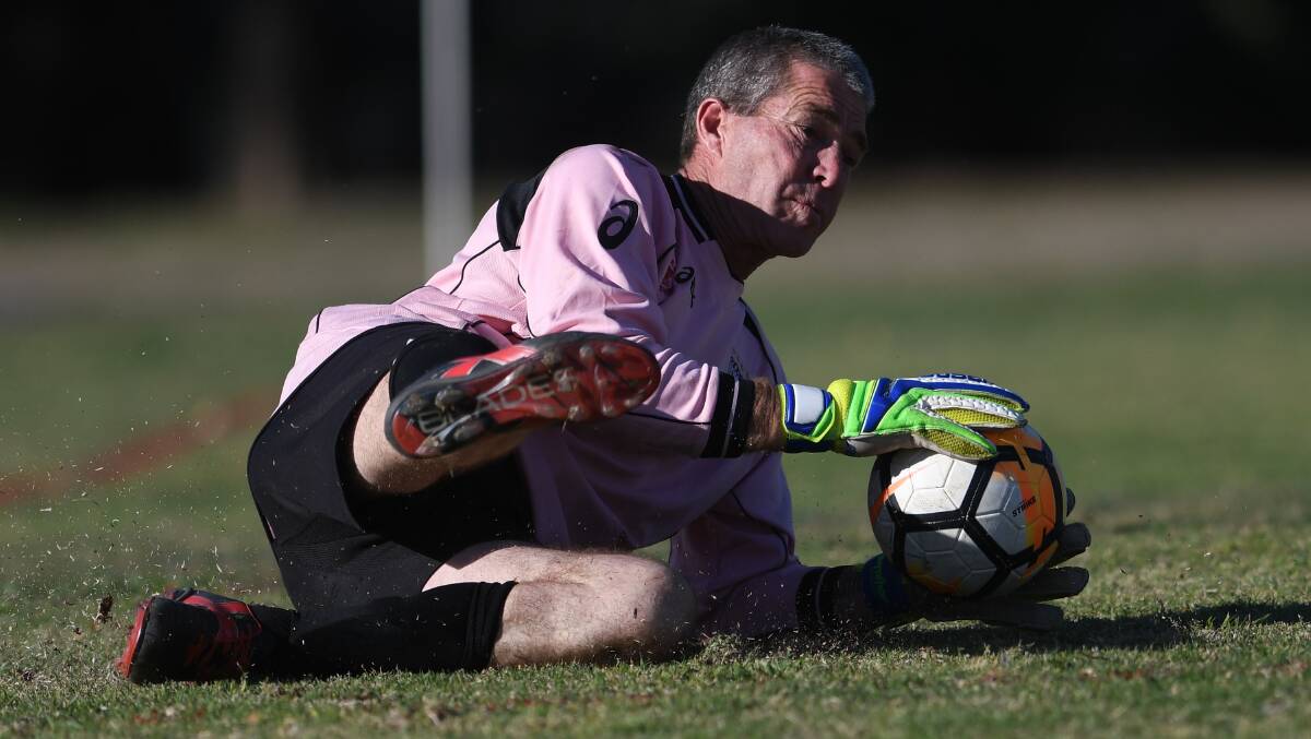 Oxley Vale keeper Troy Keyte makes this save.