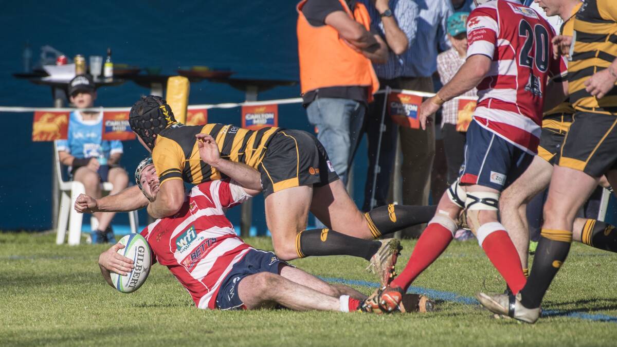 Trytime: Hooker Jock Fortescue scores Walcha's first try. Photo: Peter Hardin