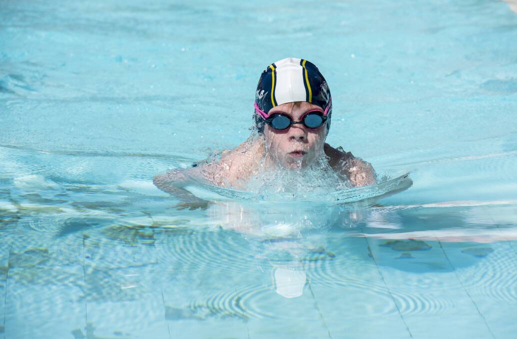 Powering through: Tamworth swimmer Will George impressed. Photo: Peter Hardin