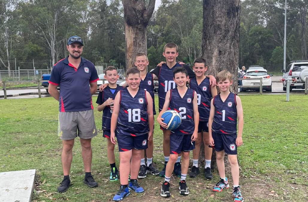 After two days competing at the State PSSA athletics championships, Bailey (back second from right) then played for Timbumburi in the state basketball knockout finals. Picture Timbumburi Public School Facebook