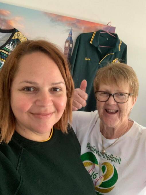 Getting in the spirit: Stacey Porter's sister Kristy and mum Robyn get ready to cheer her on. They were originally intending to go over to Japan but are instead watching on in Brisbane. 