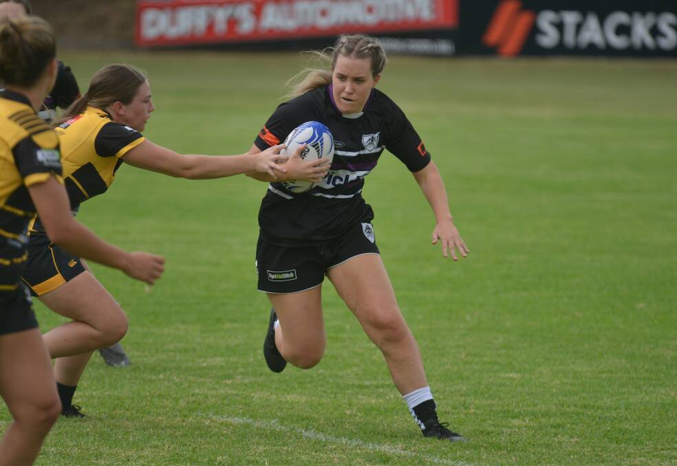 Gritty: Ellie Hannaford scored a try and picked up the three points. Photo: Mark Bode