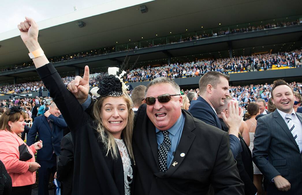 Bianca and Andrew Pieper celebrate trackside after She Will Reign's Golden Slipper win. Photo by Cassandra Hannagan