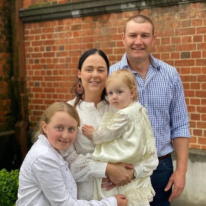 Milestone man: Simon Trappel, pictured here with wife April and daughters Elsie (two-and-a-half) and Millie (nine), is lacing up the boots for his 20th season with Pirates.