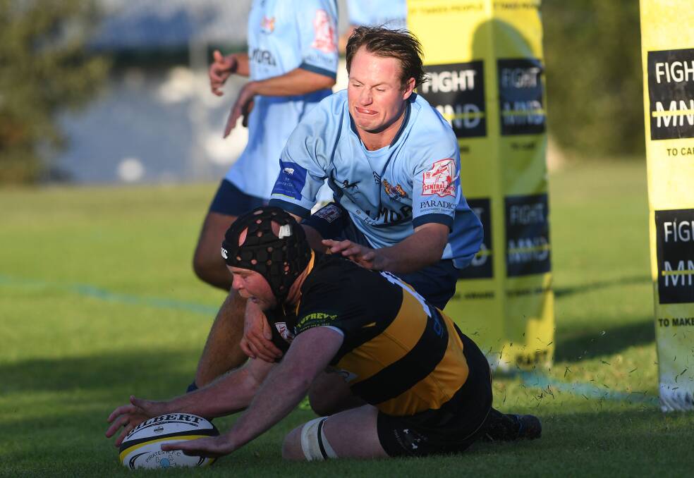 Andrew Wynne goes over for the last of Pirates' tries in their win over Scone. Picture by Gareth Gardner
