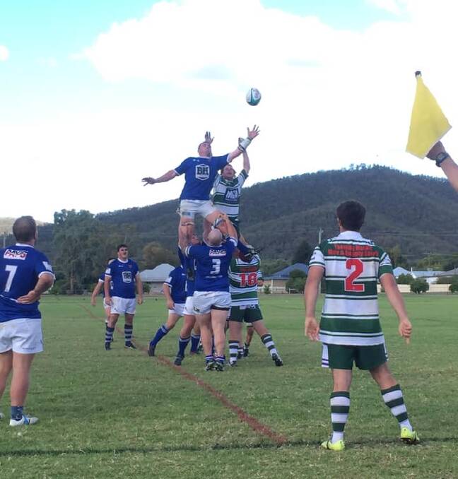 Scone (blue) and Barraba (green and white) contest this lineout on Saturday.