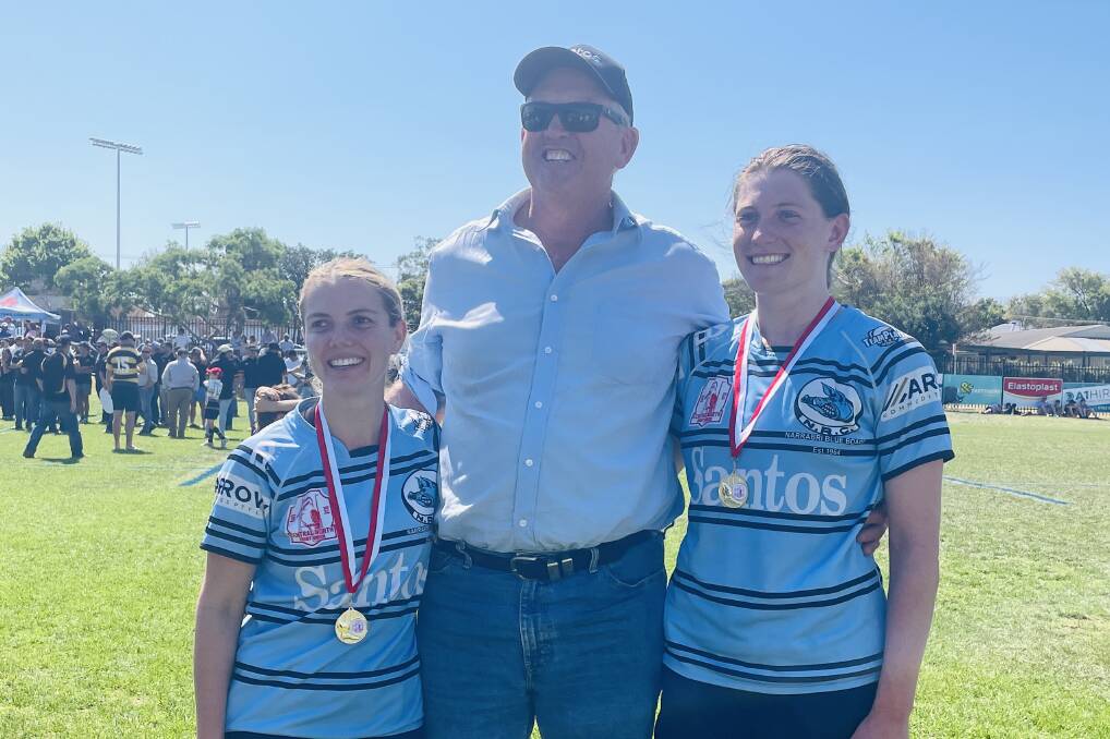 Gale (right) with Blue Boars team-mate and work colleage Gerri Cruckshank, and their boss at C&W Financial Services Dave Maxwell.