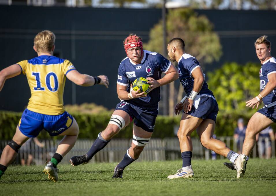 On the charge: Harry Wilson has been named in the Reds squad for Friday night's trial against the Melbourne Rebels. Photo: QRU Media/Brendan Hertel