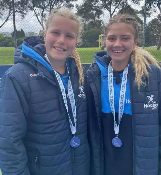 Hall and Tanna with their silver medals from the under 13s nationals in late 2022.
