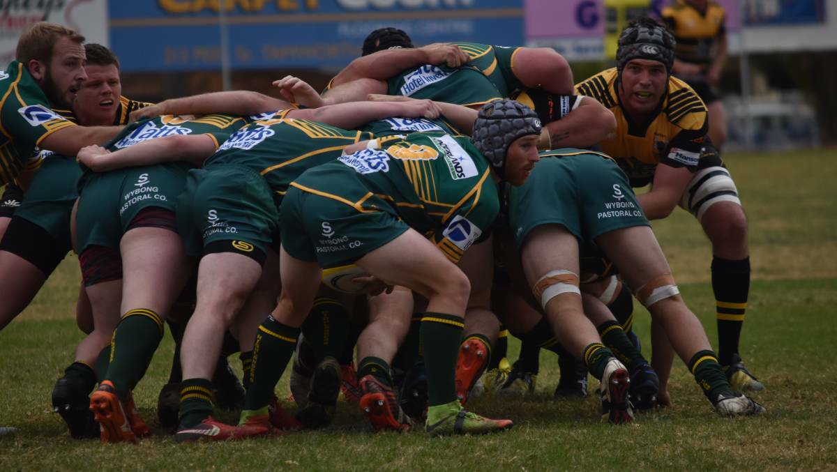 Different role: Doug Biffin, here poking his head up from this scrum against Inverell in the first round, will start at inside centre on Saturday. Photo: Ben Jaffrey