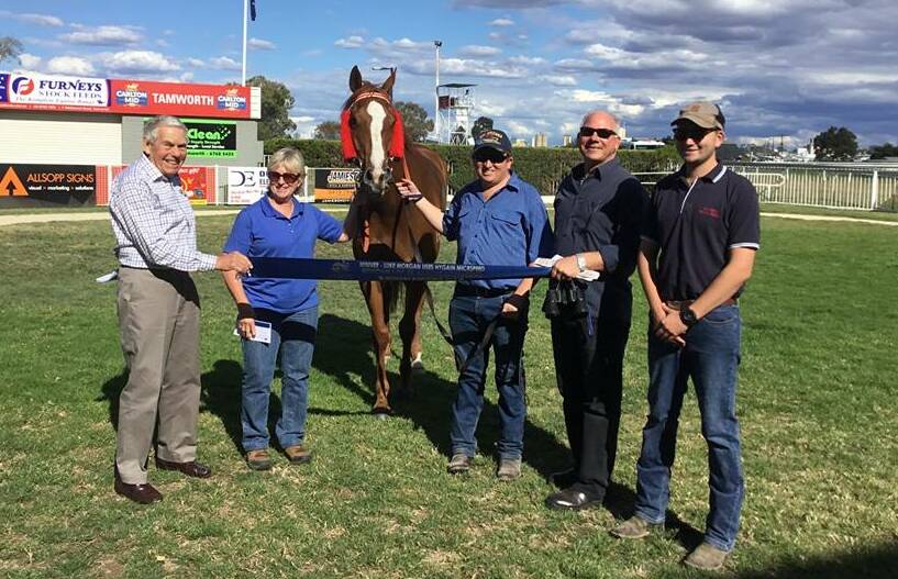 Happy hunting ground: Boolaroo's victory in the Luke Morgan Uses Hygain Micrspeed Benchmark 58 Handicap was the Sue Grills (second from left) trained gelding's fourth on his home track. Photo: Rachel Young