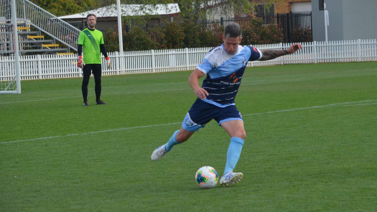 Welcome return: Grand final hero Troy Hearfield was back in the blue, sky blue and white on Saturday as Tamworth FC made it two from two. Photo: Billy Jupp