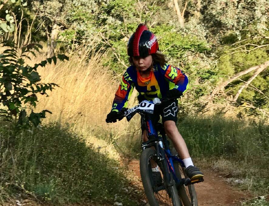 A young rider negotiates the trails. 