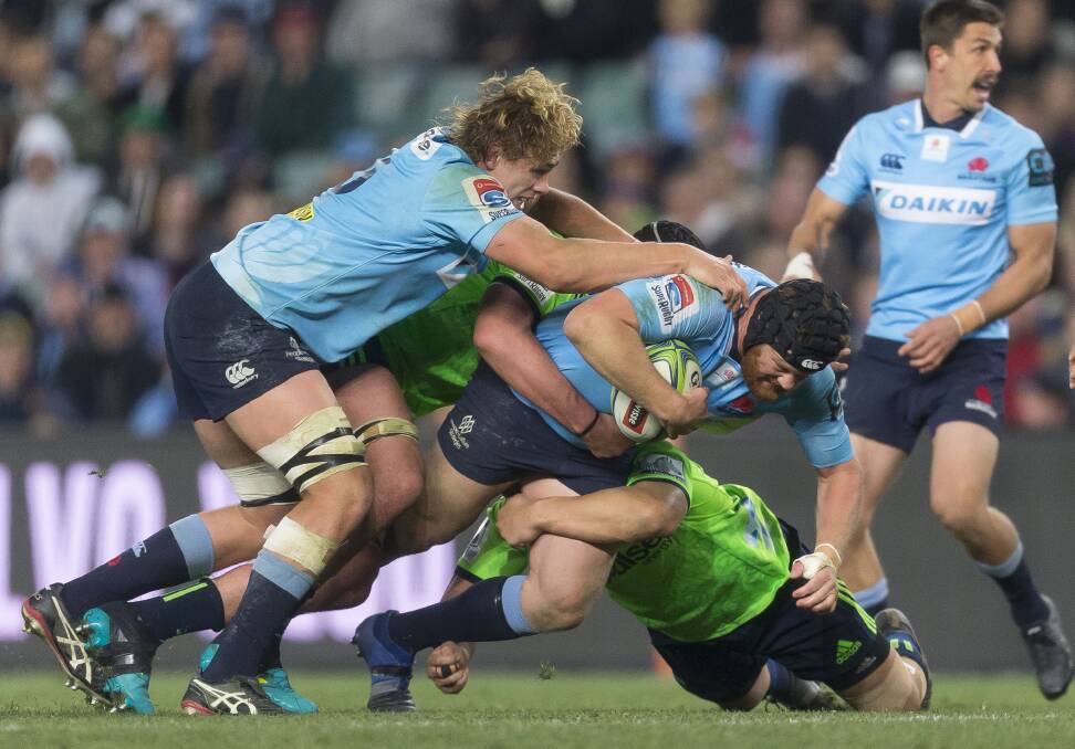Paddy Ryan takes on the Highlanders defence during their quarter-final win, and his last game at Allianz Stadium for the Waratahs.