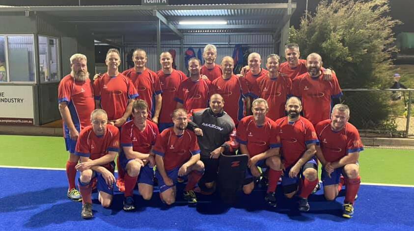 Winners are grinners: The victorious South United men's masters team